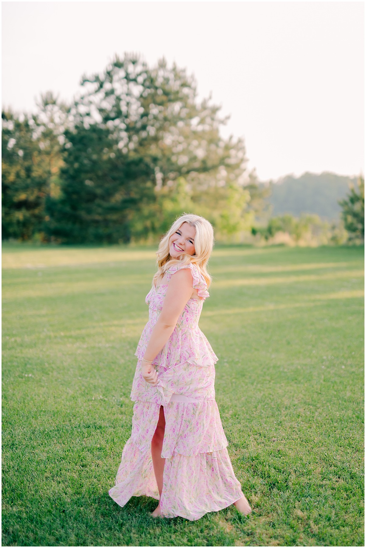 Senior girl in midi dress during golden hour session near Birmingham